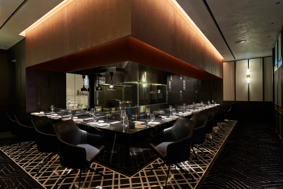 Chef Sasaki serves Italian-style omakase in a sem-private dining room.