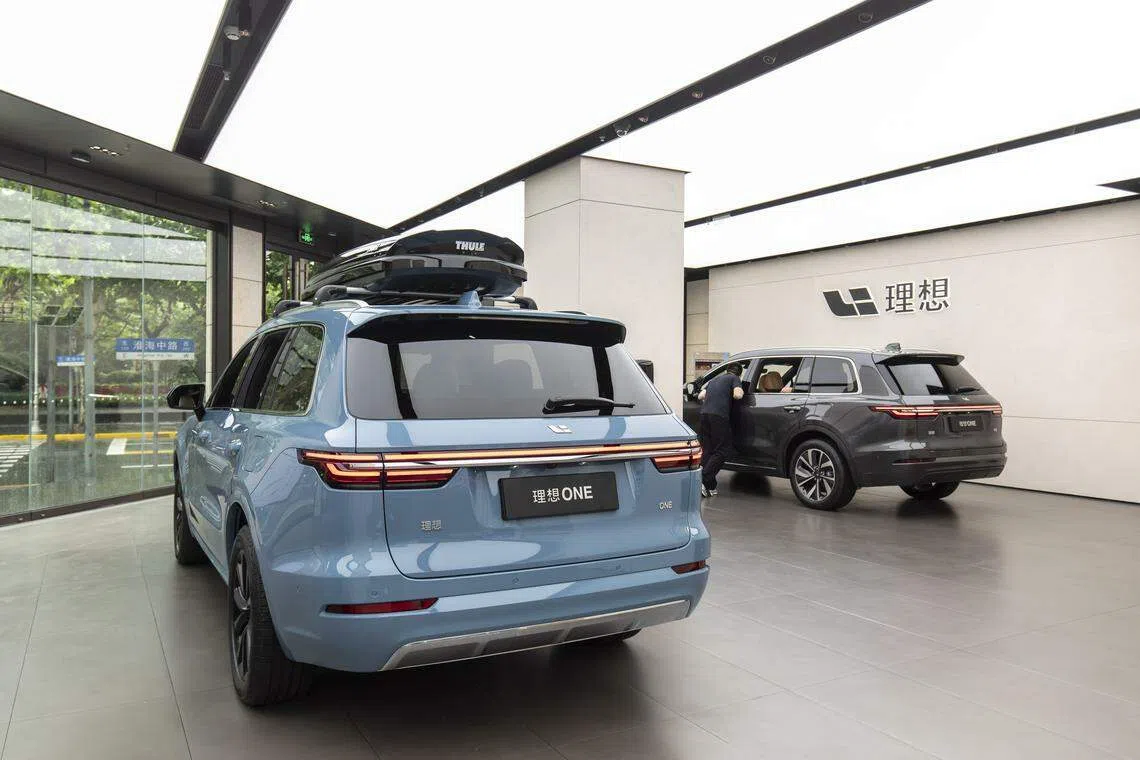 Li Auto reports net income of 11.8 billion yuan (S$2.2 billion) last year.