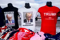 Merchandise displayed for sale ahead of a "Get Out The Vote" rally with former US President Donald Trump in Waterford Township, Michigan, Feb 17, 2024. 