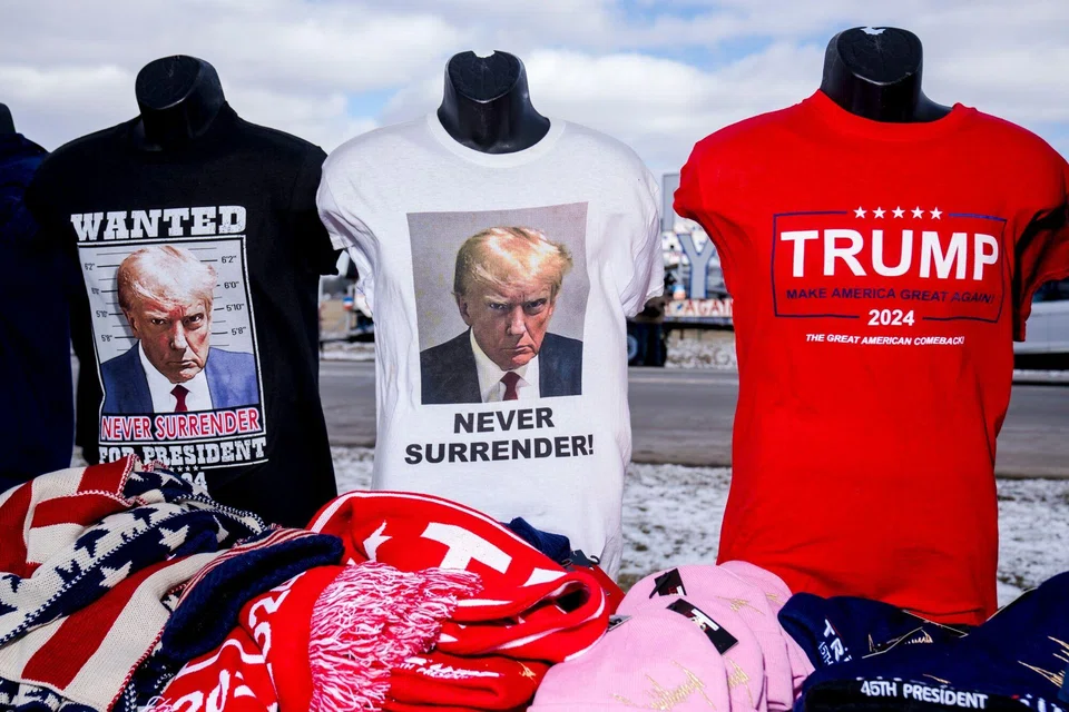Merchandise displayed for sale ahead of a "Get Out The Vote" rally with former US President Donald Trump in Waterford Township, Michigan, Feb 17, 2024. 