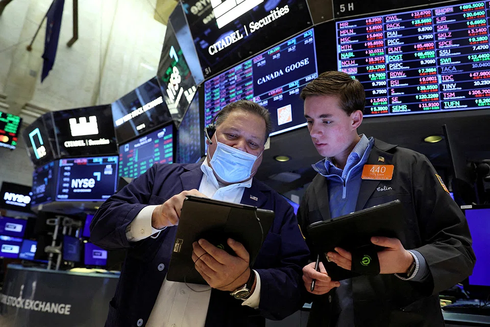 WALL STREET'S main indexes opened higher on Monday (May 23), helped by a bounce back in growth and bank stocks, after the benchmark S&P 500 hovered near a grim market milestone at the end of last week.