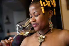 Fiona Masuku sniffs a wine at Great Heart Wines in Franschhoek, South Africa. White South Africans control a vast majority of the country’s wine industry, but it’s growing increasingly possible to support Black winemakers and owners.