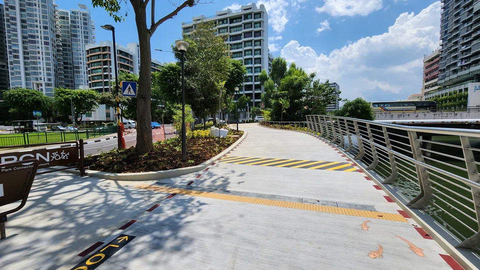 Copper inlays of fish on park connector beside Serangoon Road.