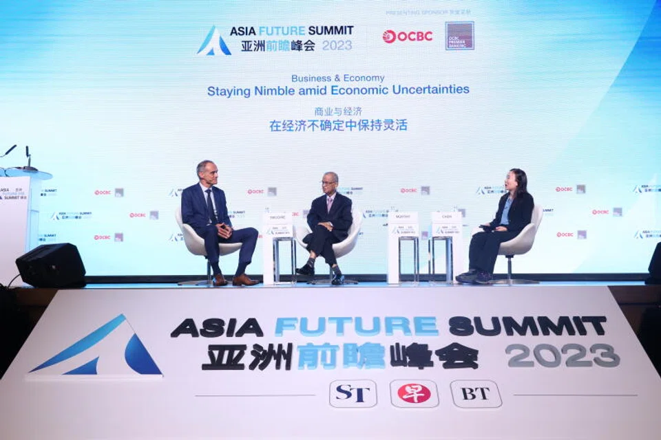 From left: Schneider Electric chairman Jean-Pascal Tricoire; Infosys founder Narayana Murthy; and moderator and editor of The Business Times Chen Huifen at a panel discussion on Thursday.