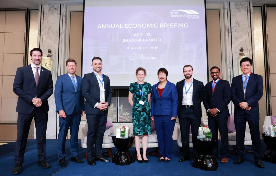 At the Annual Economic Briefing, organised by the British Chamber of Commerce Singapore, on Thursday are (from left): David Kelly, executive director of the British Chamber of Commerce Singapore; David Reynolds, partner at Select Investors; Miles Gooseman, chief executive officer of Select Investors; Michelle Jamrisko, senior Asia economy reporter at Bloomberg; Selena Ling, chief economist and head of treasury research and strategy at OCBC; Alex Holmes, senior economist at Oxford Economics; Chidu Narayanan, Asia FX and rates strategist at BNP Paribas; and Chua Hak Bin, chief economist at Maybank.  