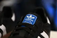 Adidas reported a small operating profit of 60 million euros and a lower gross margin of 44.8 per cent due to higher supply chain costs and increased discounting.