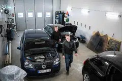 Oskar Flyman (right) and his brother Jakob working in their garage in Balsta, north-west of Stockholm. They specialise in converting regular cars into A-traktors. 