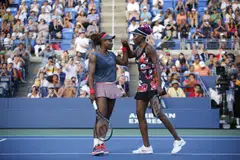 The prime-time doubles match reminded tennis once again of the immense popularity of the Williams sisters and the absolute hold they have on the sport.