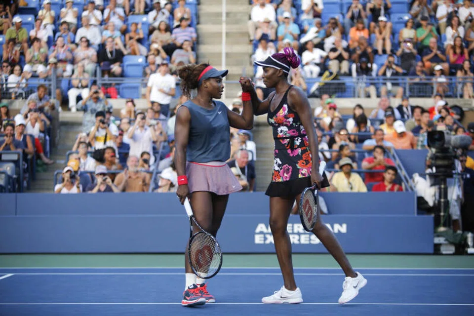 The prime-time doubles match reminded tennis once again of the immense popularity of the Williams sisters and the absolute hold they have on the sport.
