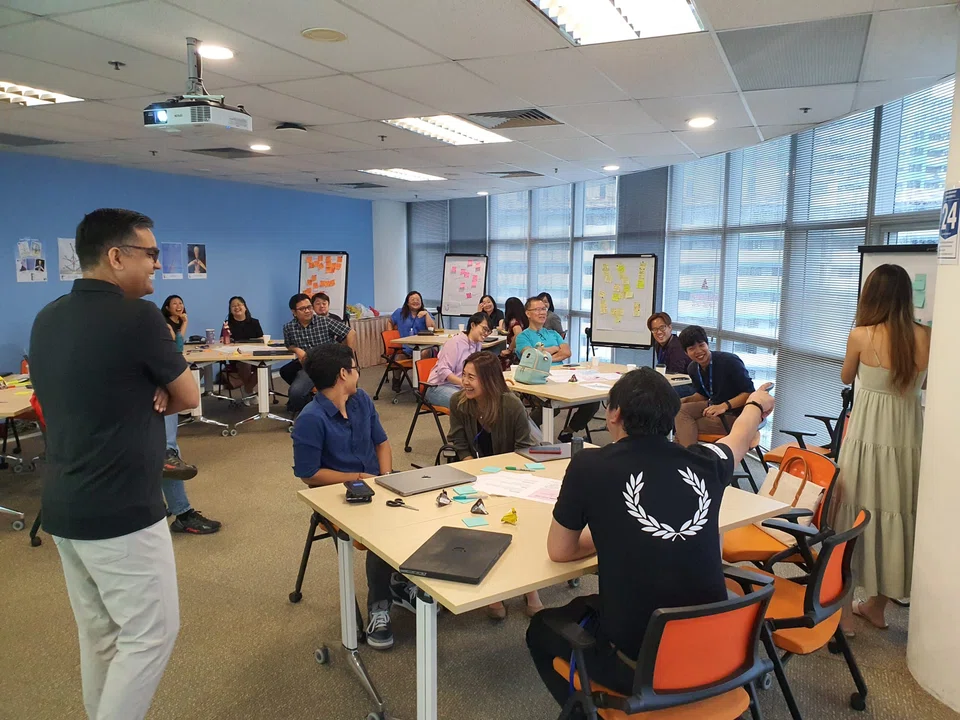 Cross-functional BT stakeholders collaborating at a product design workshop in September 2022