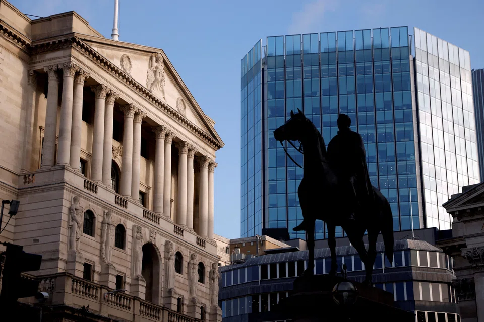 FILE PHOTO: A general view shows the Bank of England in the City of London financial district in London, Britain, November 5, 2020. REUTERS/John Sibley/File Photo