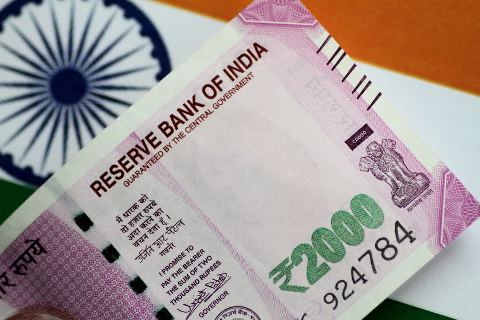 The rupee opened at a record low of 80.2850 per US dollar, down from 79.9750 in the previous session.