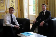 Tesla CEO Elon Musk meets with France's President Emmanuel Macron (left) at the Elysee presidential palace in Paris, May 15, 2023. Musk will meet Macron on Friday for the second time in just over a month. 