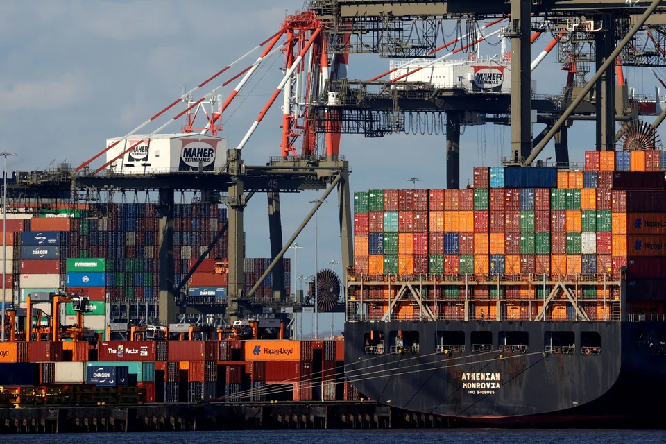 US trade deficit increases 5.1 per cent to US$64.3 billion.