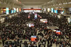 Travellers wait for their trains at Shanghai Hongqiao railway station, during the Spring Festival travel rush ahead of the Chinese New Year.