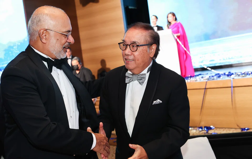 Piyush Gupta, chief executive officer of DBS catching up with the bank’s chairman Peter Seah.