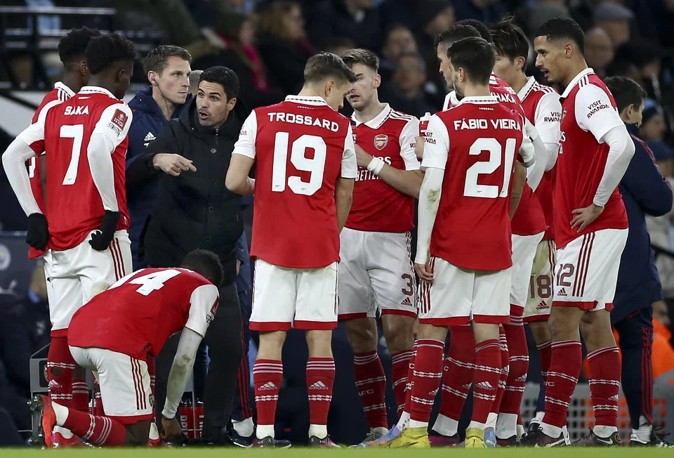 Arsenal manager Mikel Arteta (in black) talking to his players at last weekend's FA Cup match against Manchester City. Arsenal play second-from-bottom Everton in the Premier League on Saturday.