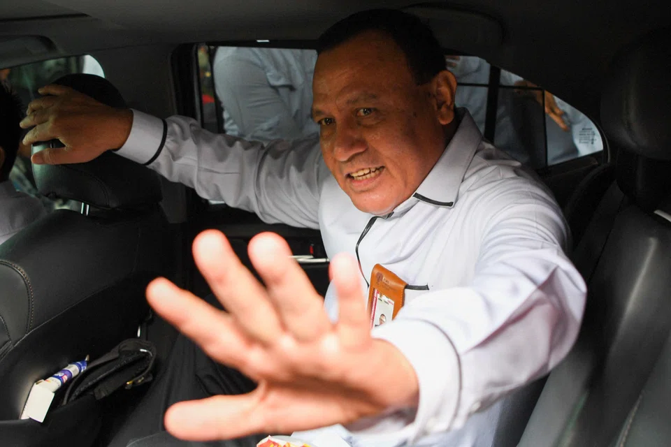 Firli Bahuri, chairman of the Corruption Eradication Commission, enters his car after responding to the summons at the KPK Anti-Corruption Education Center building in Jakarta, Indonesia.