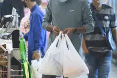From Jul 3, supermarket operators with an annual turnover of over S$100 million will need to impose a five-cent per plastic bag charge on all shoppers.
