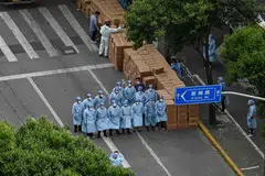 Shanghai is tightening its already strict Covid-19 lockdown in a fresh push to eliminate infections outside quarantined areas.