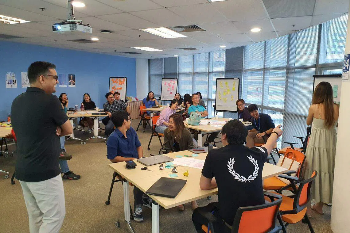 Cross-functional BT stakeholders collaborating at a product design workshop in September 2022