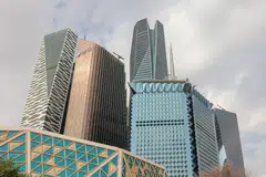 The Saudi National Bank headquarters (right) in the King Abdullah Financial District in Riyadh, Saudi Arabia. The bank's 9.9 per cent stake in Credit Suisse is now valued at about 304 million Swiss francs following the UBS offer.