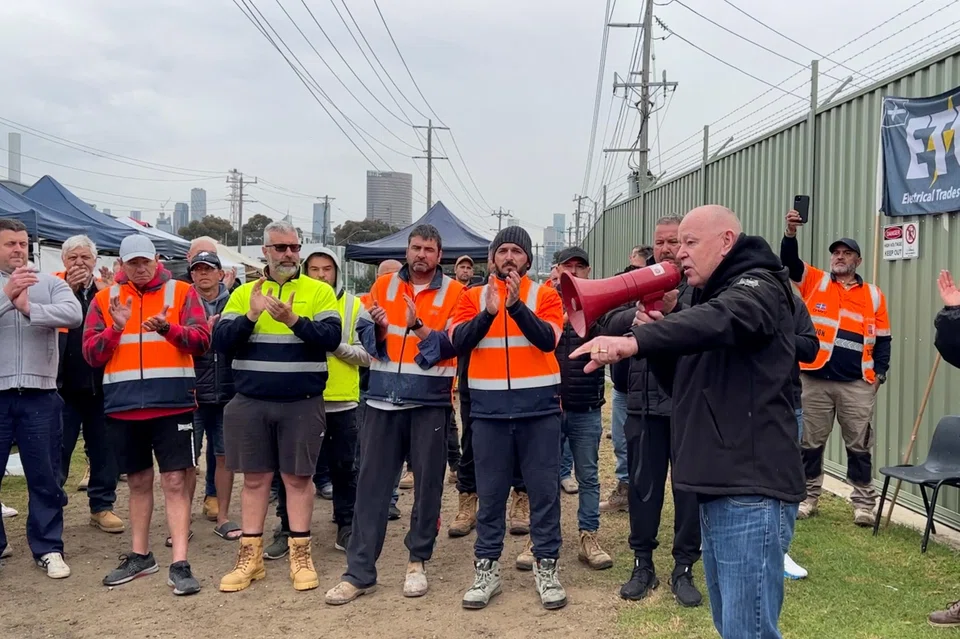Former union leader Christy Cain rallies workers on strike at Knauf plasterboard plant in Port Melbourne, Australia, Oct 5, 2022.