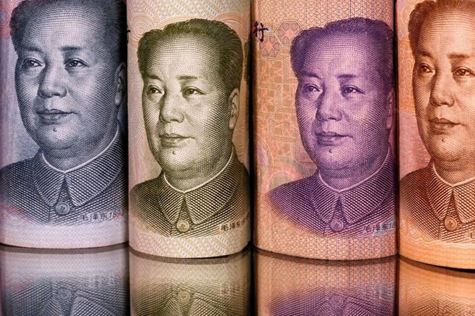 The yuan's sudden slide looks set to gather pace over the next few months as markets price in a worsening outcome for the Covid-stricken economy. 