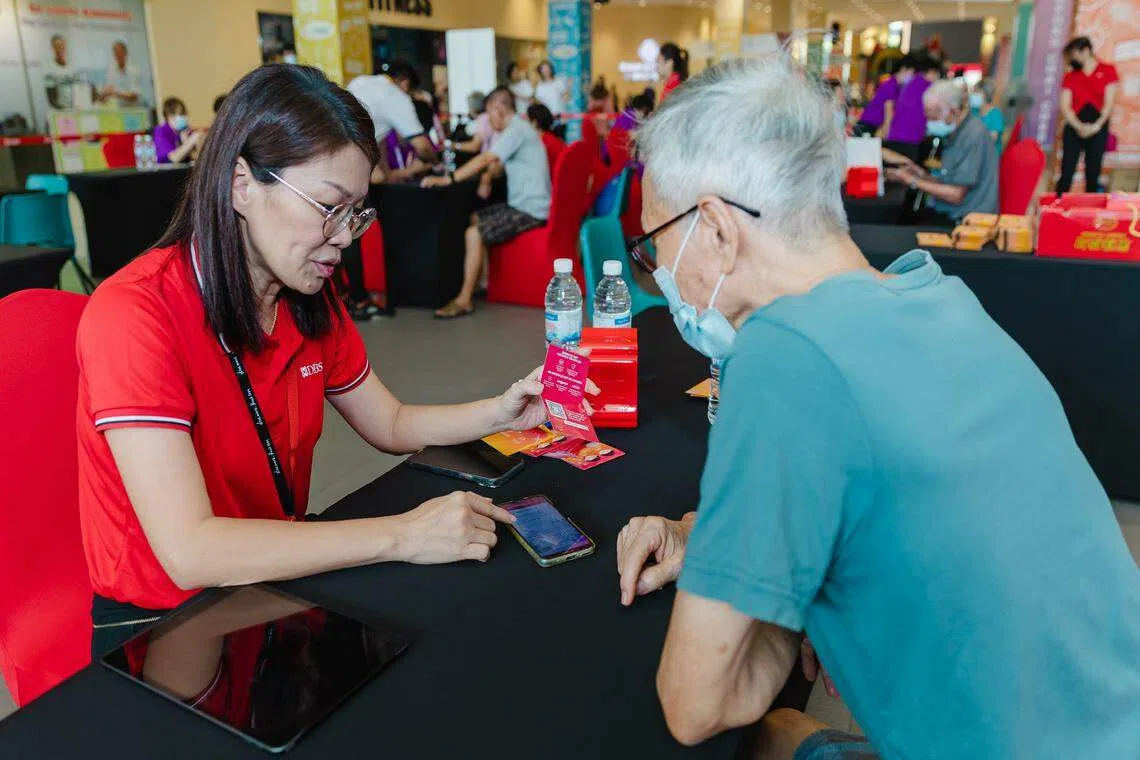 About 250 senior citizens learn how to make cashless payments and spot scams at the first set of Digital for Life workshops.
