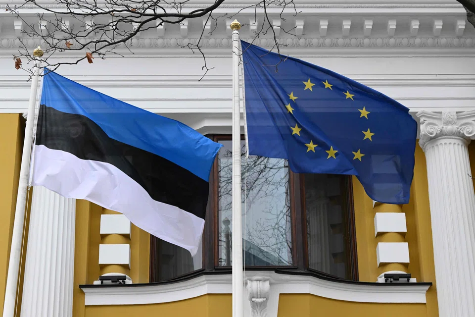 Estonian and EU flags fly outside the Estonian embassy in Moscow; the Russian foreign ministry said it had told the Estonian envoy he must leave next month, and both countries would be represented in each other’s capitals by an interim charge d’affaires instead of an ambassador.