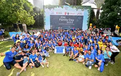 Citi staff celebrating Citi Family Day with the announcement of the bank’s partnership with Touch Community Services. At the centre (in red) is guest of honour Eric Chua, Senior Parliamentary Secretary for MCCY and MSF.