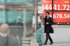 The Nikkei has finished Monday nearly 1 per cent higher at 35,901.73, after touching the highest since February 1990 at 36,008.23.