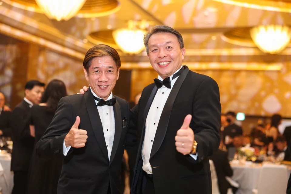 Alvin Tay (left) board member, Mapletree Commercial Trust & member, SBA judging panel with Christopher Ong, senior vice­president & managing director, DHL Express Singapore. 