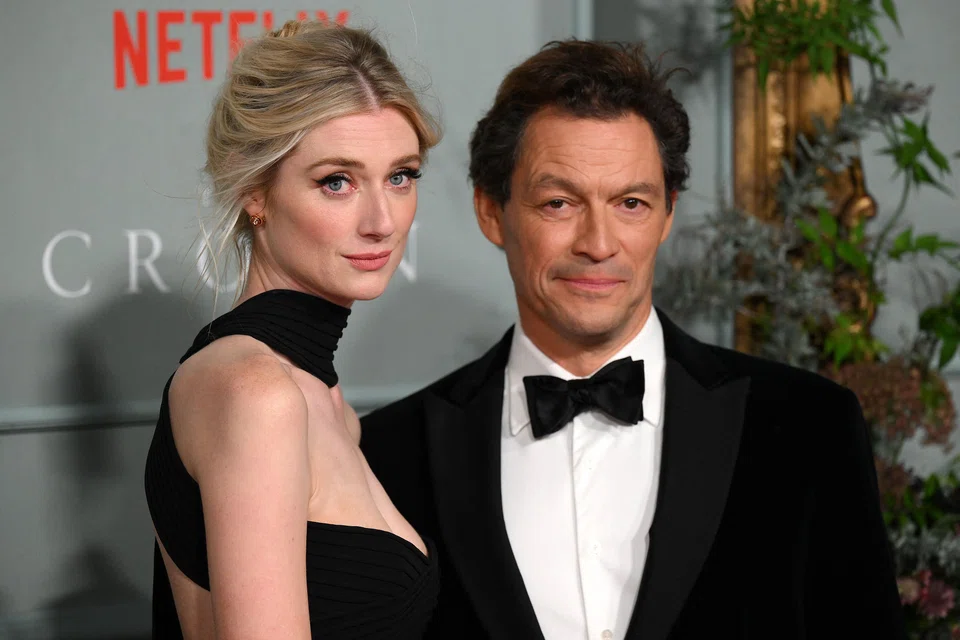  Australian actor Elizabeth Debicki with English actor Dominic West in London, at last week's world premiere of season five of The Crown, in which they play Princess Diana and Prince Charles. 