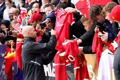 Manchester United manager Erik ten Hag signs autographs for fans after a training session in Perth during the team's pre-season tour in July. The Dutchman faces a difficult first season at Old Trafford. 