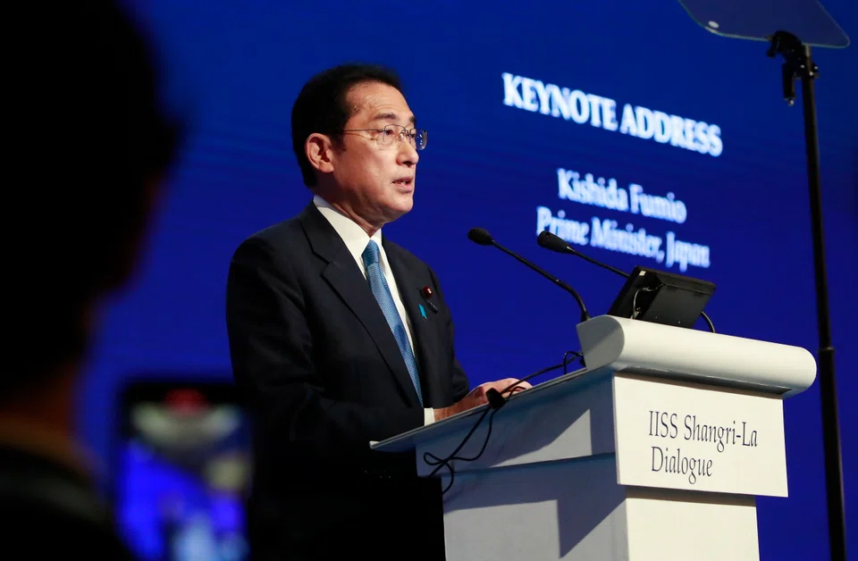 Japan’s Prime Minister Fumio Kishida delivers his keynote address during the International Institute for Strategic Studies (IISS) Shangri-la Dialogue at the Shangri-la hotel in Singapore, 10 June 2022. 