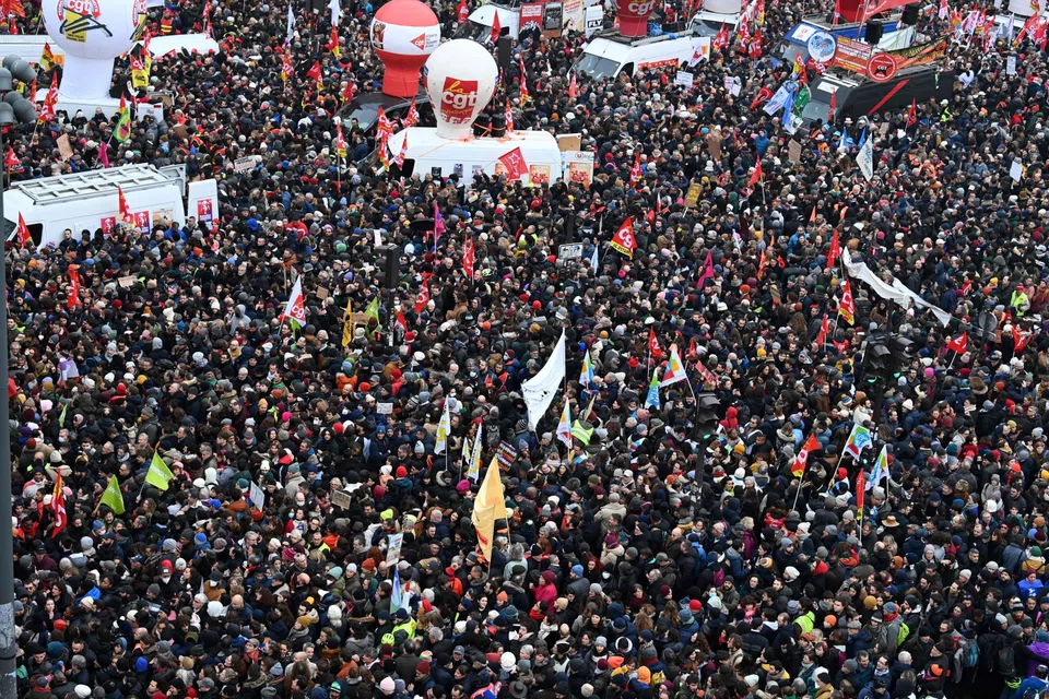 Demonstrators gather at Place de la Republique during a rally called by French trade unions in Paris, Jan 19, 2023.