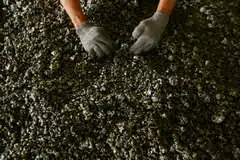 Nickel ore in a ferronickel smelter owned by state miner Aneka Tambang at Pomala district, Indonesia. DBS Group Research recommends "hold" on the stock with a target price of 2,100 rupiah.