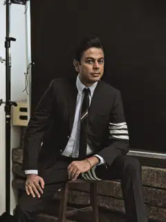 Anurag Srivastava in shirt, suit & tie by Thom Browne.