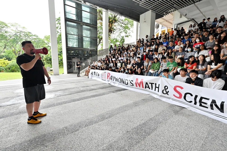 Teen students visiting an NUS open house. They were brought there by a tuition centre.