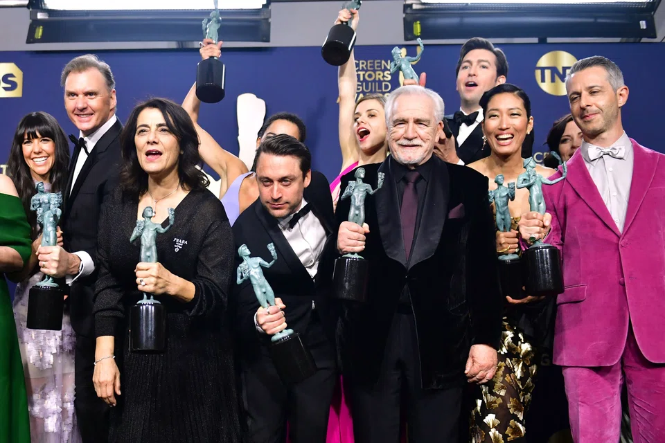  In this file photo taken on Feb 27, 2022, Scottish actor Brian Cox (3rd R), US actor Jeremy Strong (R) and members of the cast from “Succession” pose with the award for Outstanding Performance by an Ensemble in a Drama Series, in the press room during the 28th Annual Screen Actors Guild Awards in Santa Monica, California. Succession topped this year’s Emmy nominations, earning 25 nods.