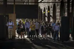 Office workers in Sydney's central business district.  On Feb 8, Australia's Senate passed a Bill giving workers the right to ignore calls and messages outside of working hours without fear of repercussion. 
