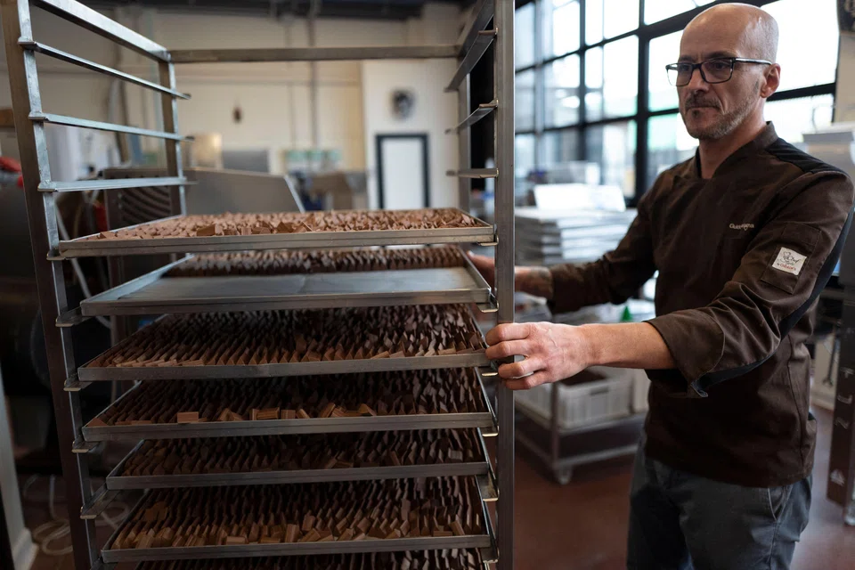 Guido Castagna making gianduiotto in his workshop in Giaveno near Turin, Italy. With Christmas just a few days away, production of the sweet is in full swing here. 