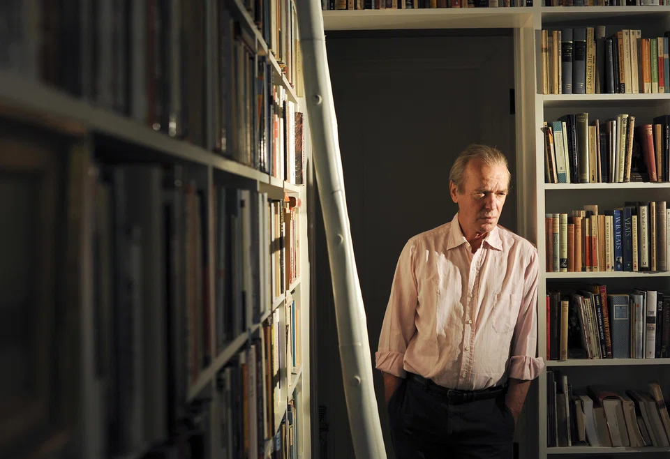 Amis at home in Brooklyn in a 2012 file photo. The son of renowned comic novelist Kingsley Amis, he equalled and even surpassed his father in fame with novels filled with savage humour.