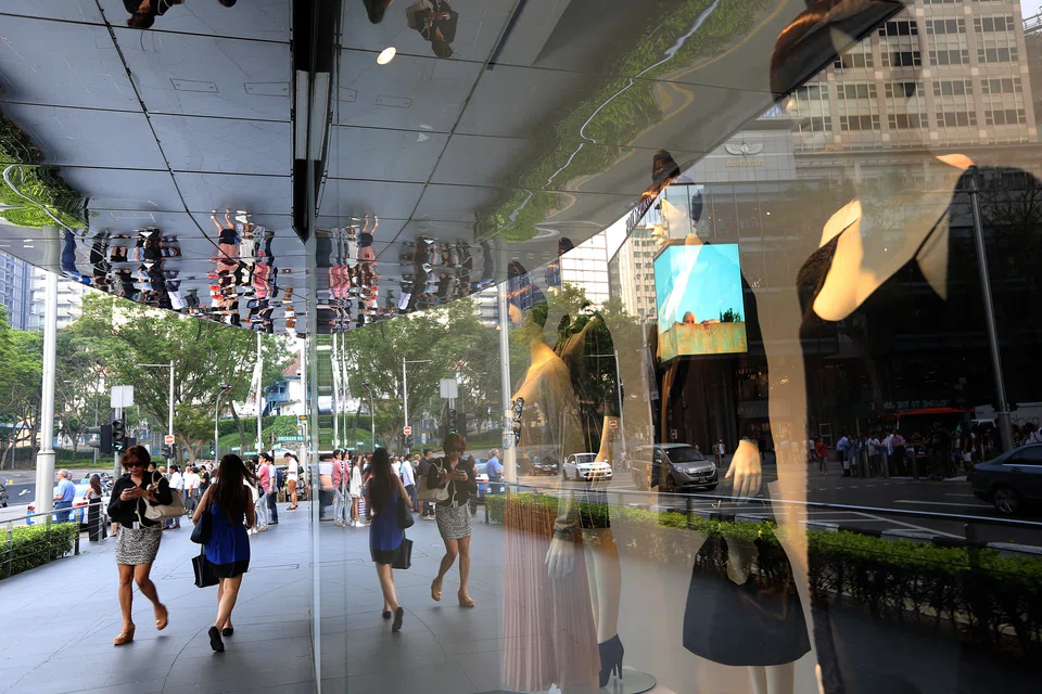 High-street fashion shop H&M along Orchard Road in Singapore. The fashion sector was behind 4 per cent of global emissions in 2018 – about the same as Britain, France and Germany combined. About 30 firms (including H&M) signed up to the Fashion Industry Charter for Climate Action at the COP24 summit in Poland in 2018.