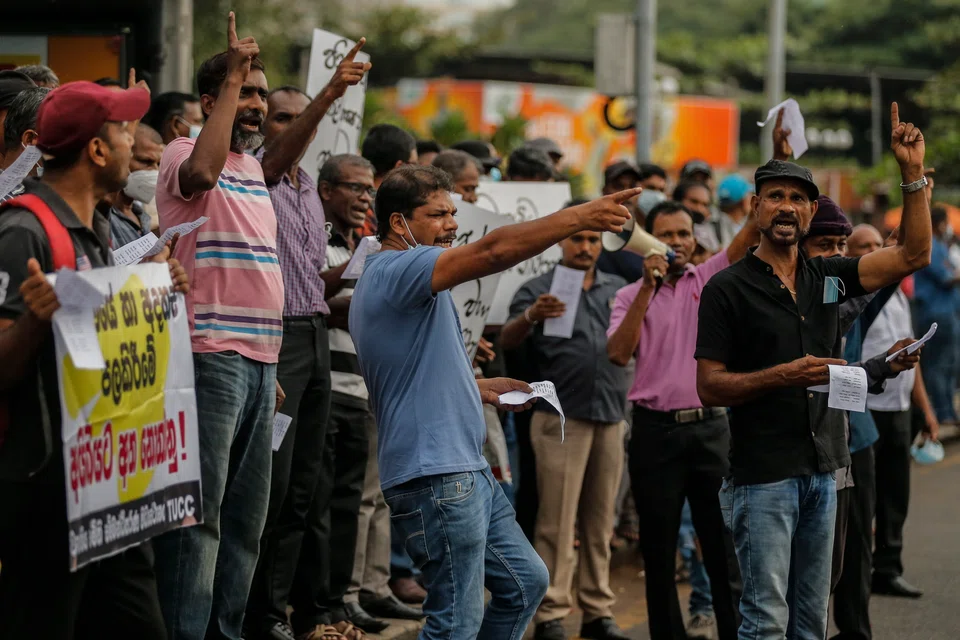 Trade union members shout anti government slogans during a protest in Colombo, Sri Lanka, 27 July 2022. Trade union members stage a protest calling for the resignation of the new president and demanding a fresh parliamentary election. 
