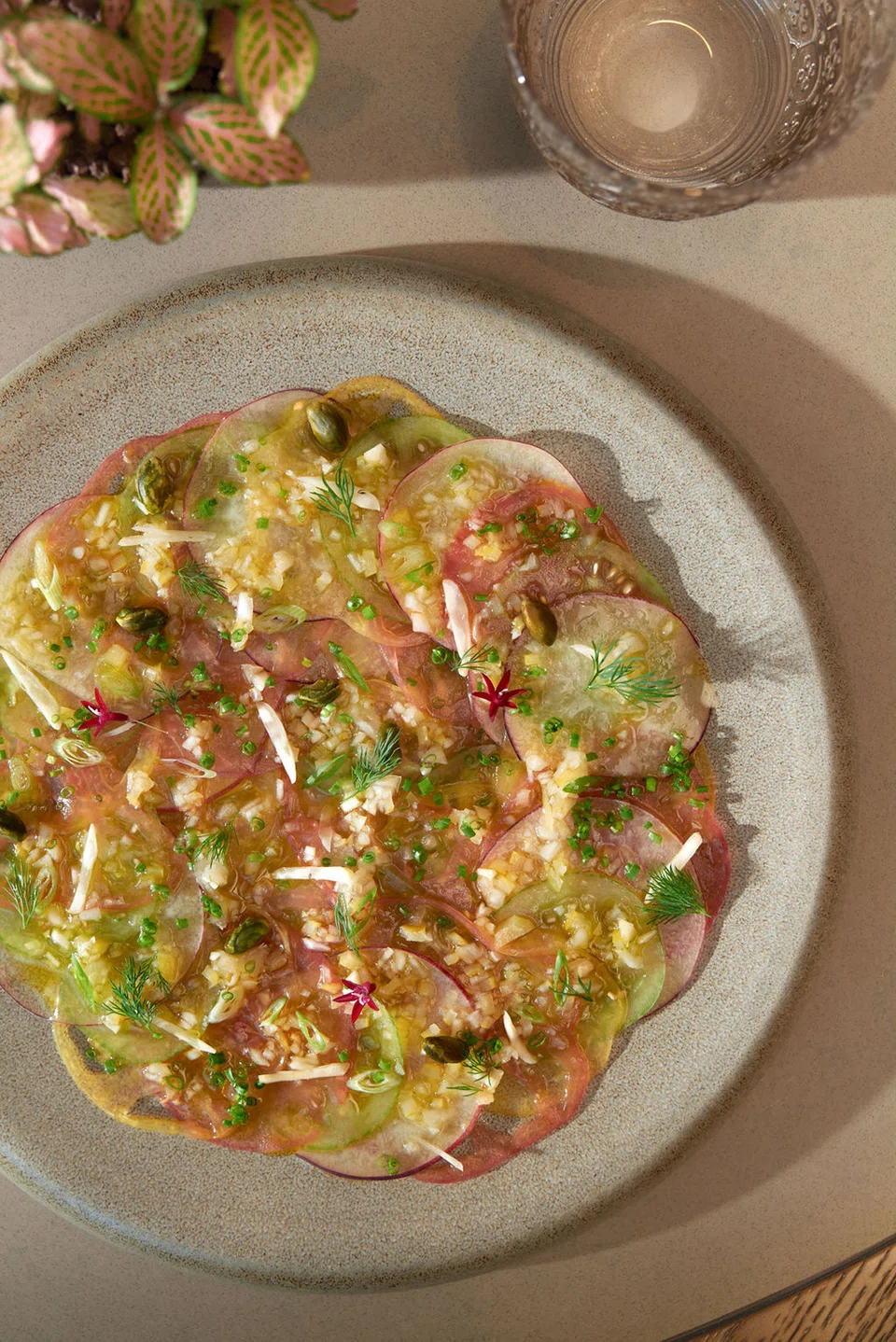 Carpaccio of tomato and peaches.