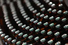 Bottles of Chang beer move along the production line at Thai Beverage's Beer Thip brewery in Bang Ban, Ayutthaya province in Thailand.