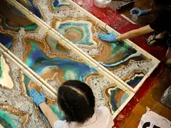 The art auction features 12 resin geode artworks, created by children from The Salvation Army and volunteers from Peace of Art.