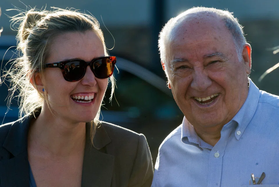 Amancio Ortega (R), the billionaire behind the Zara fashion brand, has bought a commercial building in Glasgow for US$254 million.
